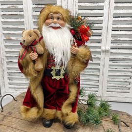 Weihnachtsmann mit Teddy & Geschenkesack