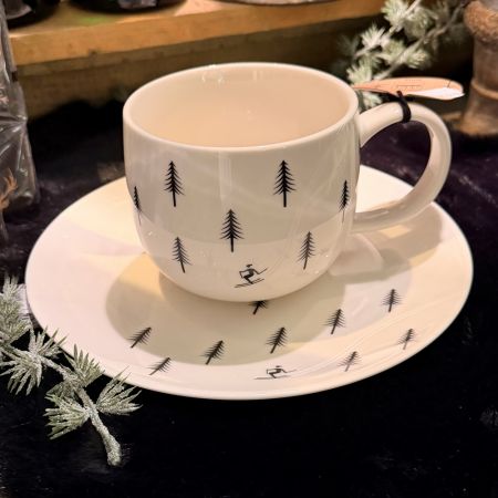 Henkelbecher 'Skifahrer im Winterwald'